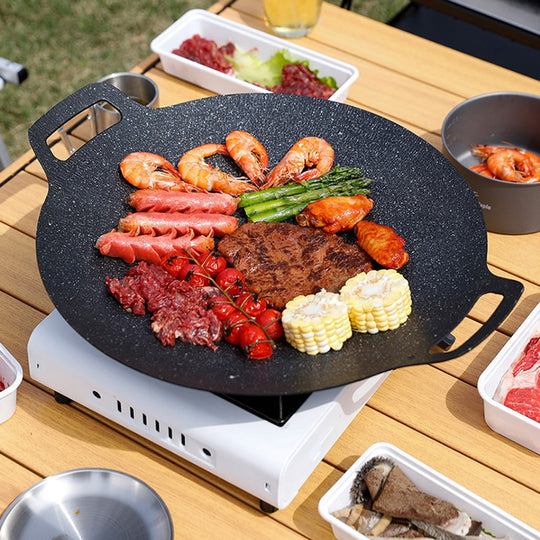 GrillMaster Pro — Plaque de cuisson ronde avec poignées, pour cuisiner en intérieur comme en extérieur