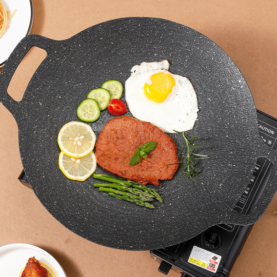 GrillMaster Pro — Plaque de cuisson ronde avec poignées, pour cuisiner en intérieur comme en extérieur
