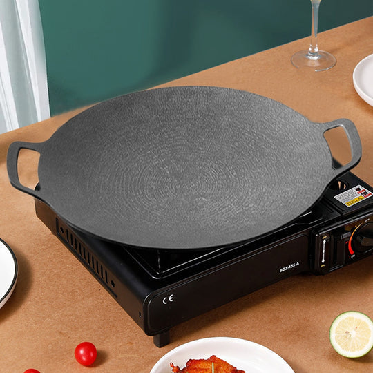 GrillMaster Pro — Plaque de cuisson ronde avec poignées, pour cuisiner en intérieur comme en extérieur