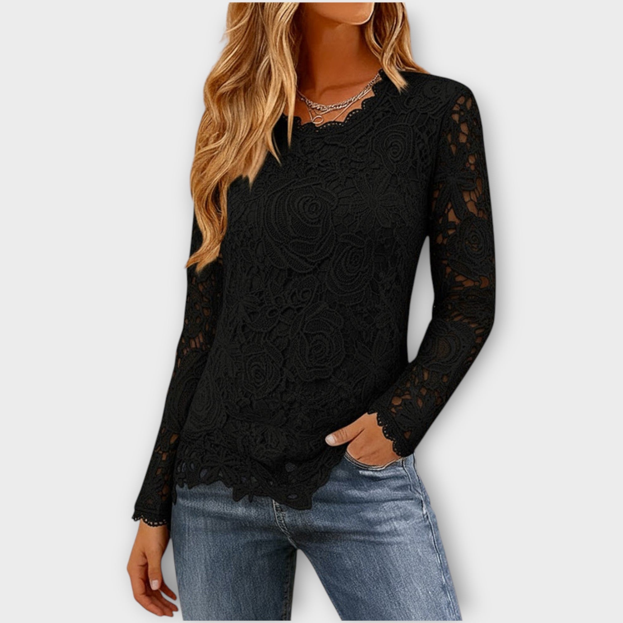 Top elegante in pizzo floreale a maniche lunghe