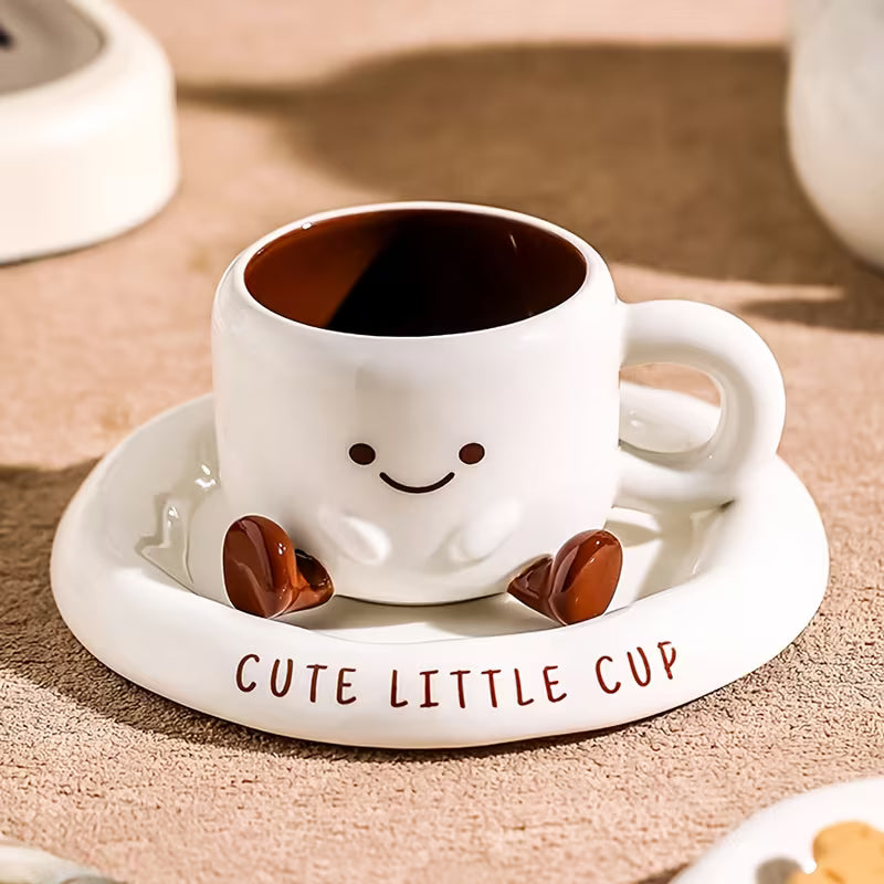 Set de taza y platillo de cerámica para café Luno con diseño animado