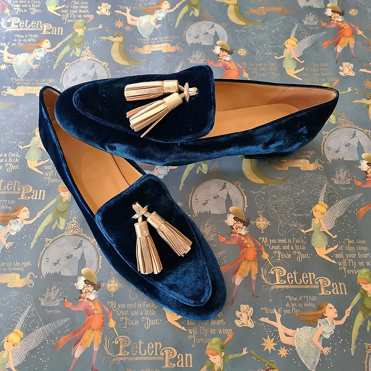Mocassini eleganti color notte con nappine champagne