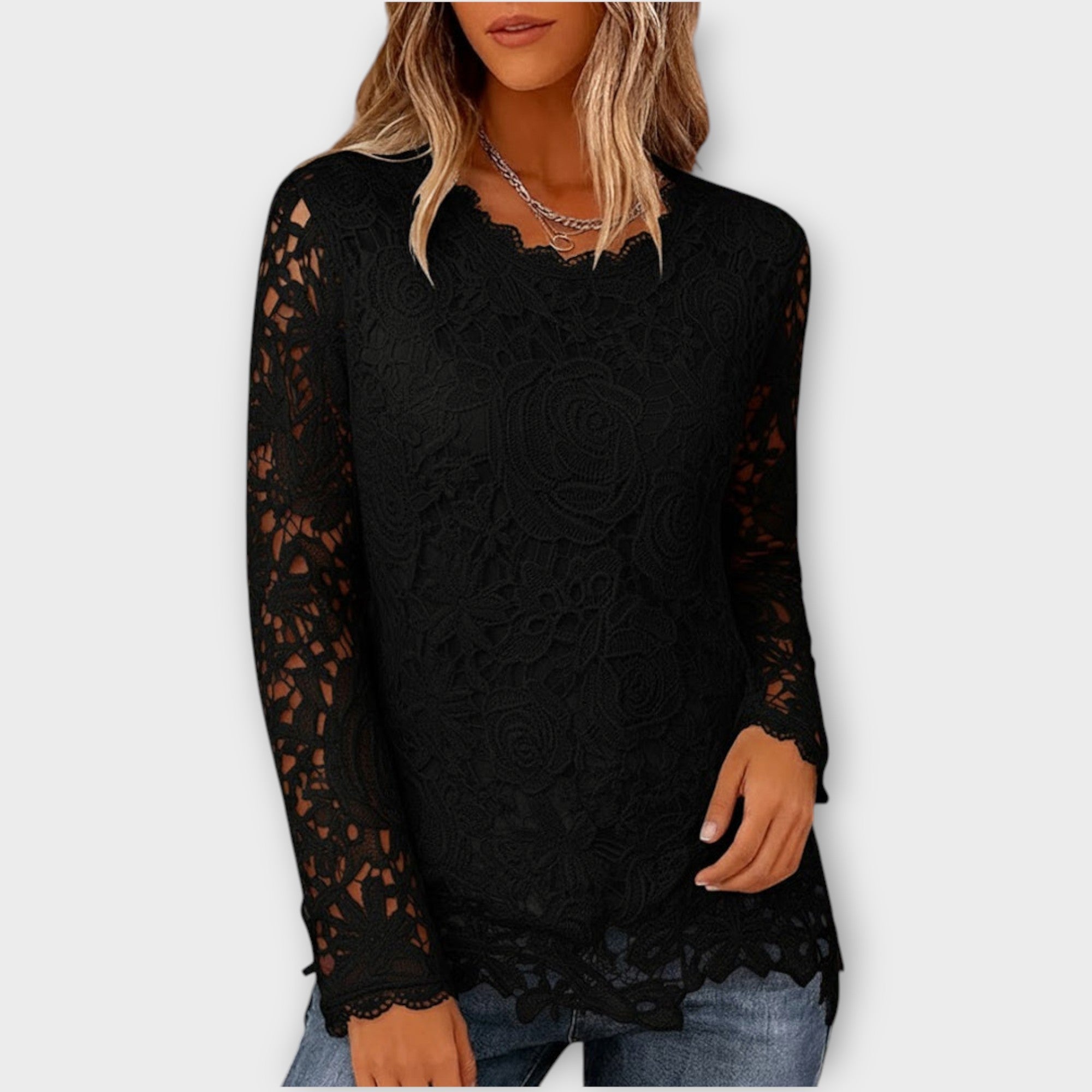 Top elegante in pizzo floreale a maniche lunghe