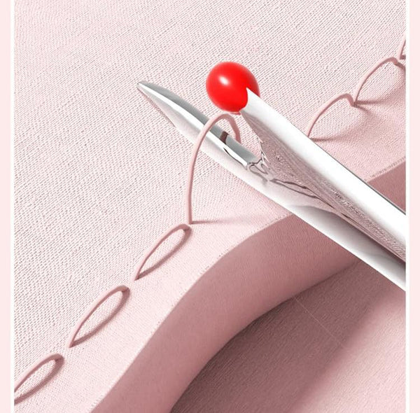 ThreadMaster – kompaktní páráček švů a navlékač nitě do jehly
