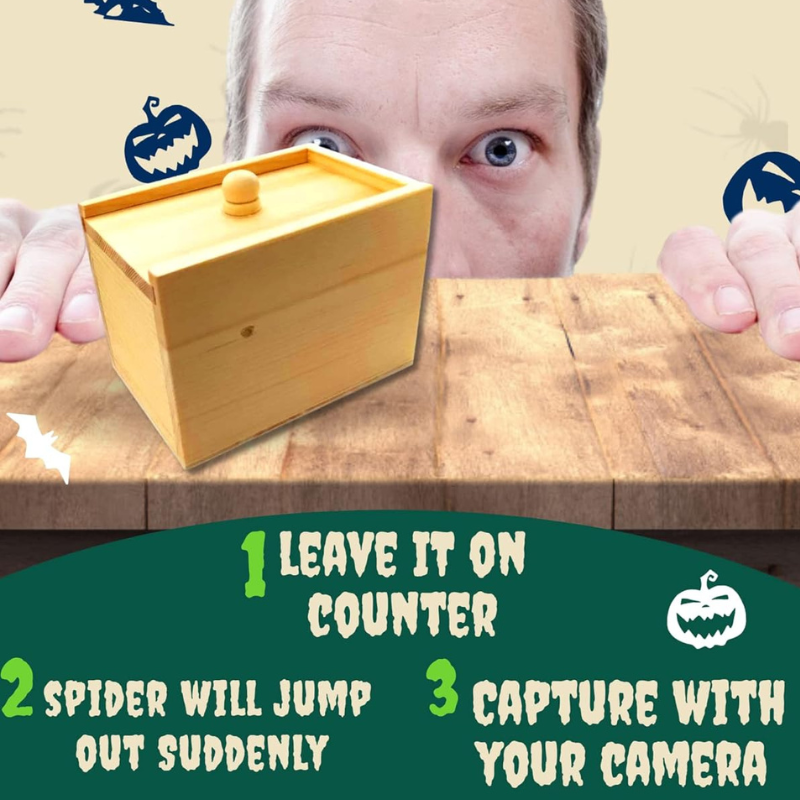 Trææske til edderkoppespøg med overraskelse, der springer op